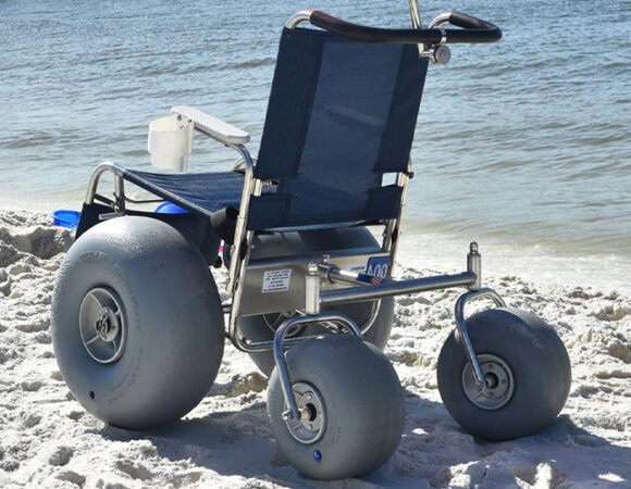 a beach wheelchair being used at the beach and other Beach Wheelchair Rentals in Avalon, NJ, Ocean City, NJ, Sea Isle City, NJ, Strathmere, NJ, Wildwood, NJ, Cape May, NJ and Surrounding Areas